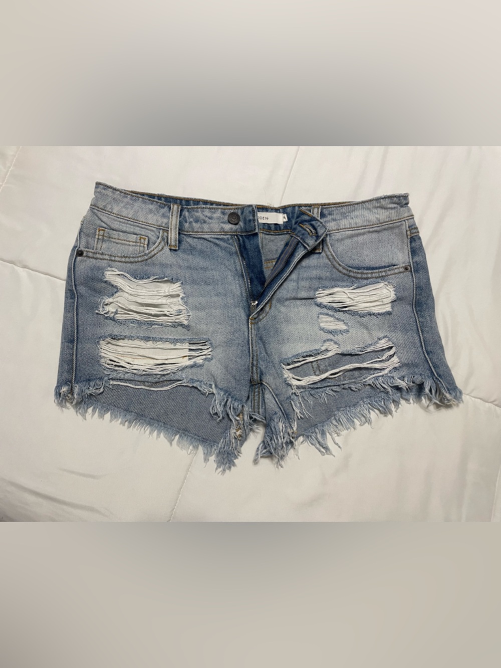 Ripped Light Blue Denim Cutoff Shorts - Women's